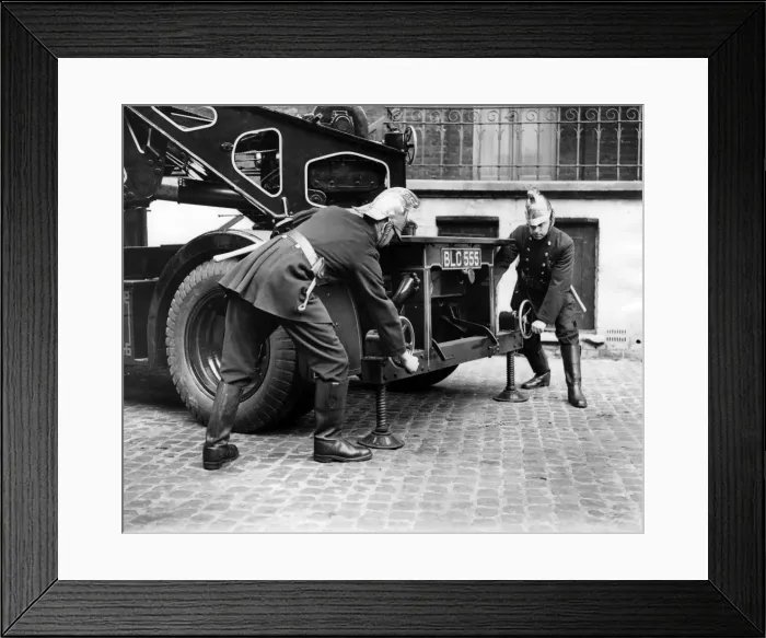 Framed Print : LFB firefighters adjusting back of vehicle Framed Print : LFB firefighters adjusting back of vehicle