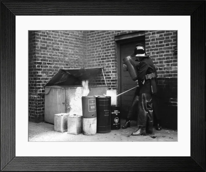 Framed Print : LFB firefighters extinguishing oil can fire Framed Print : LFB firefighters extinguishing oil can fire