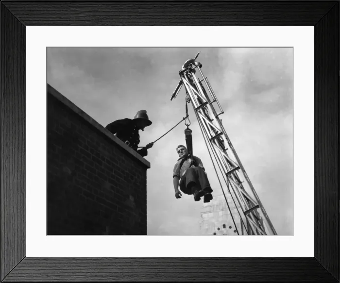 Framed Print : LFB turntable ladder in action, with rescued person Framed Print : LFB turntable ladder in action, with rescued person