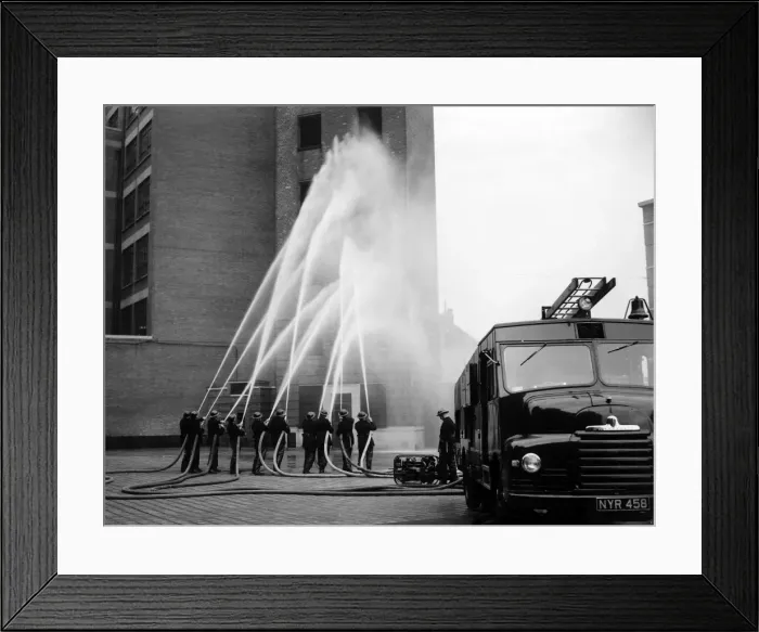 Framed Print : LFB firefighters in multi-hose display Framed Print : LFB firefighters in multi-hose display