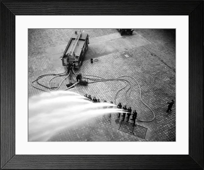 Framed Print : LFB firefighters in multi-hose display Framed Print : LFB firefighters in multi-hose display