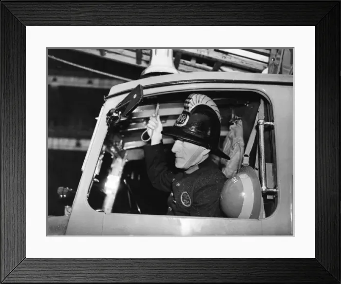 Framed Print : LFB firefighter in enclosed pump vehicle Framed Print : LFB firefighter in enclosed pump vehicle