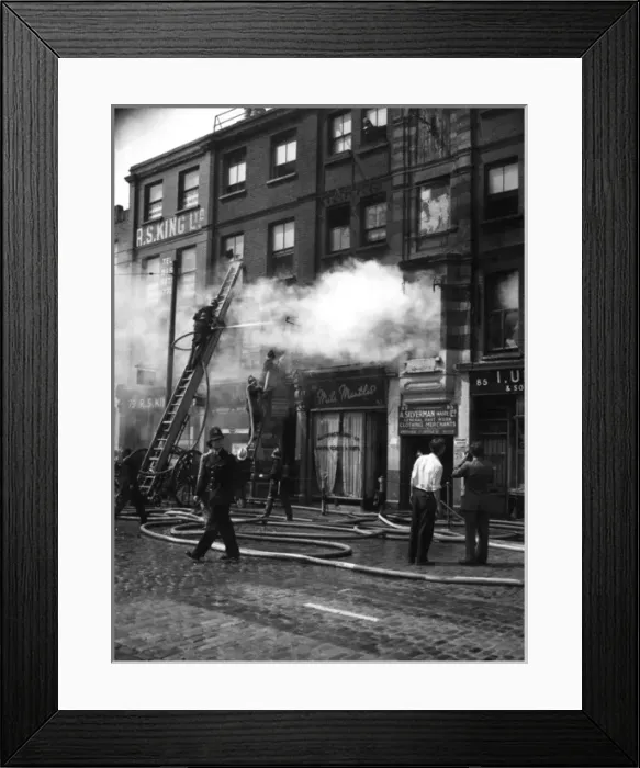 Framed Print : Firefighters in action in Commercial Road, East London Framed Print : Firefighters in action in Commercial Road, East London