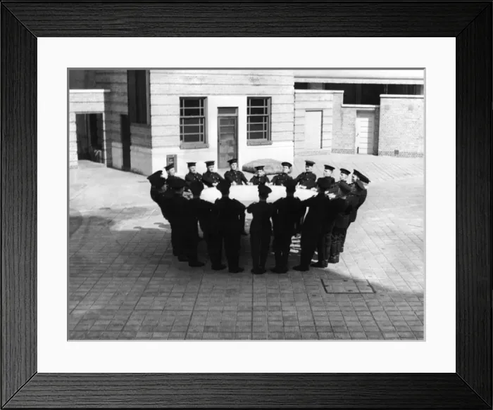 Framed Print : Firefighters with jumping sheet, Lambeth HQ, London Framed Print : Firefighters with jumping sheet, Lambeth HQ, London