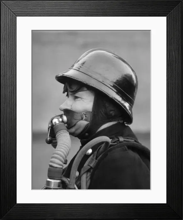 Framed Print : Firefighter in new breathing apparatus helmet