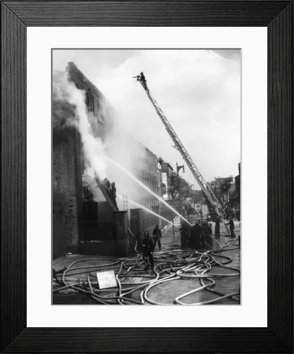 Framed Print : Firefighters in action with ladder and hosepipes Framed Print : Firefighters in action with ladder and hosepipes