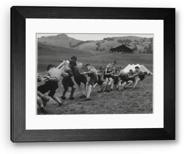 Framed Print : French scouts playing tug of war at camp in Switzerland Framed Print : French scouts playing tug of war at camp in Switzerland