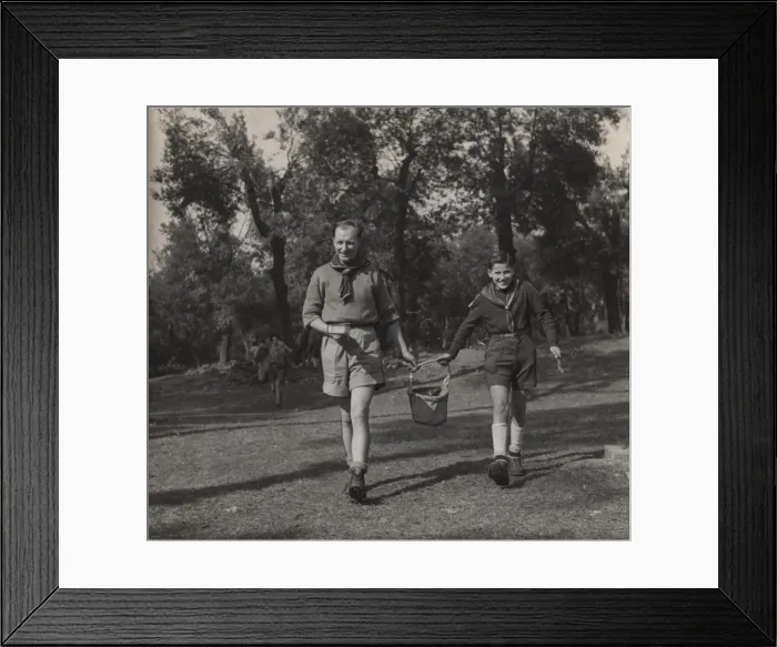 Framed Print : French boy scout and leader carrying bucket Framed Print : French boy scout and leader carrying bucket