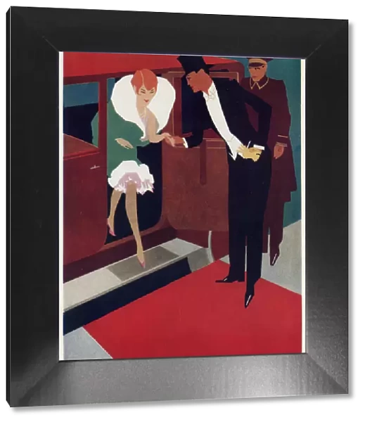 Stepping on a red carpet, 1920s couple in evening dress