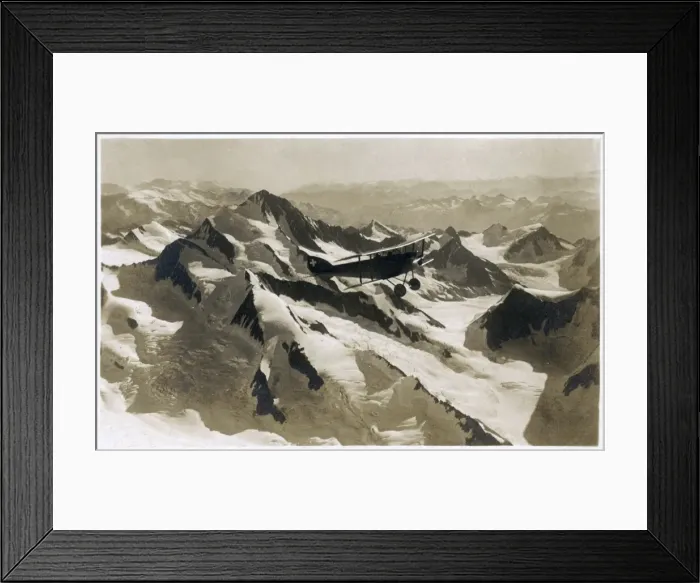 Framed Print : Biplane over Gruneckhorn, Finsteraarhorn, Switzerland Framed Print : Biplane over Gruneckhorn, Finsteraarhorn, Switzerland