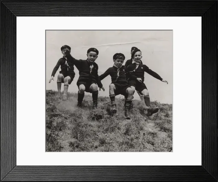Framed Print : French cub scouts sliding down a slope Framed Print : French cub scouts sliding down a slope
