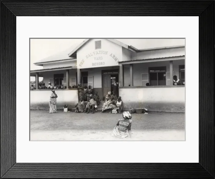 Framed Print : People outside Salvation Army medical building, Ghana Framed Print : People outside Salvation Army medical building, Ghana