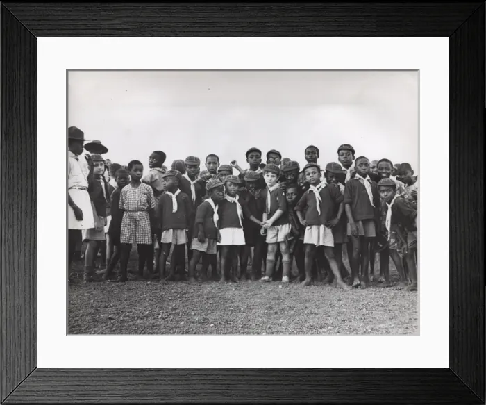 Framed Print : Wolf cubs watching athletics, Ghana, West Africa Framed Print : Wolf cubs watching athletics, Ghana, West Africa