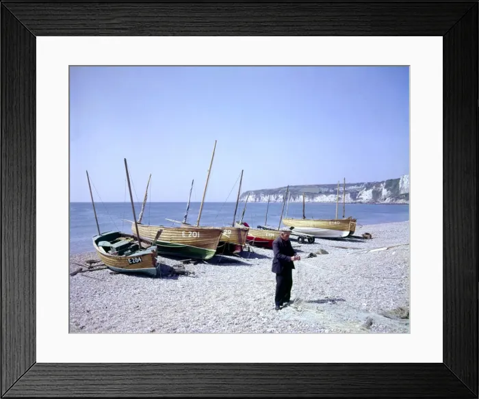 Framed Print : Man with boats and fishing nets at Seaton, Devon Framed Print : Man with boats and fishing nets at Seaton, Devon