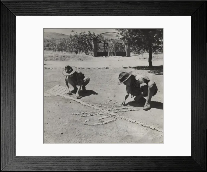 Framed Print : Boy scouts creating a design on the ground, Greece Framed Print : Boy scouts creating a design on the ground, Greece