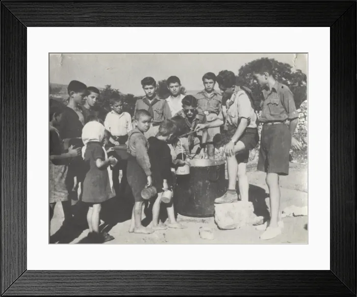 Framed Print : Greek boy scouts supplying water to children Framed Print : Greek boy scouts supplying water to children