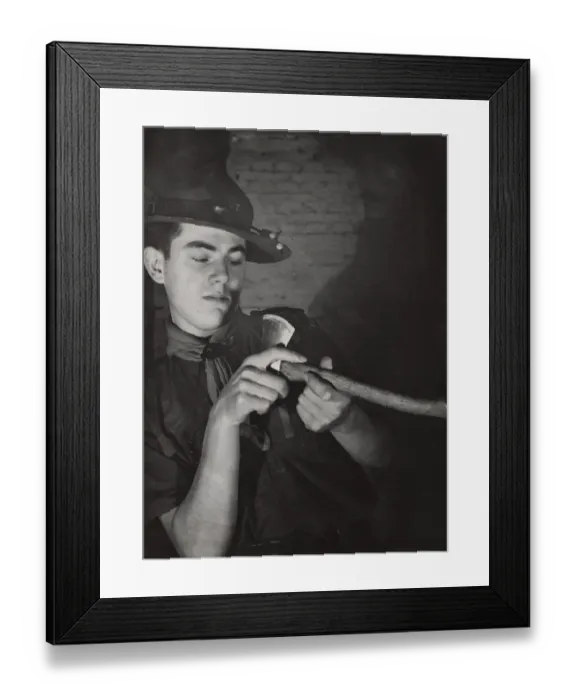 Framed Print : Dutch rover scout sharpening an axe Framed Print : Dutch rover scout sharpening an axe
