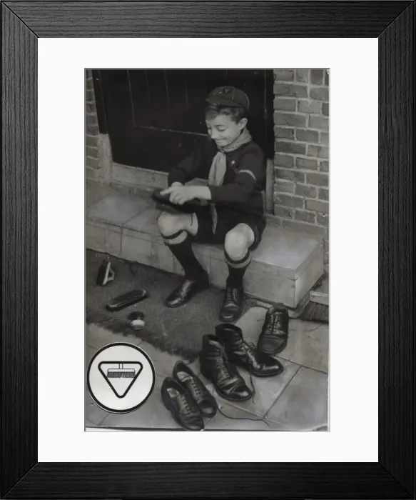 Framed Print : Dutch cub scout polishing shoes, Netherlands Framed Print : Dutch cub scout polishing shoes, Netherlands