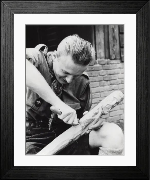 Framed Print : Dutch boy scout carving wood, Holland Framed Print : Dutch boy scout carving wood, Holland