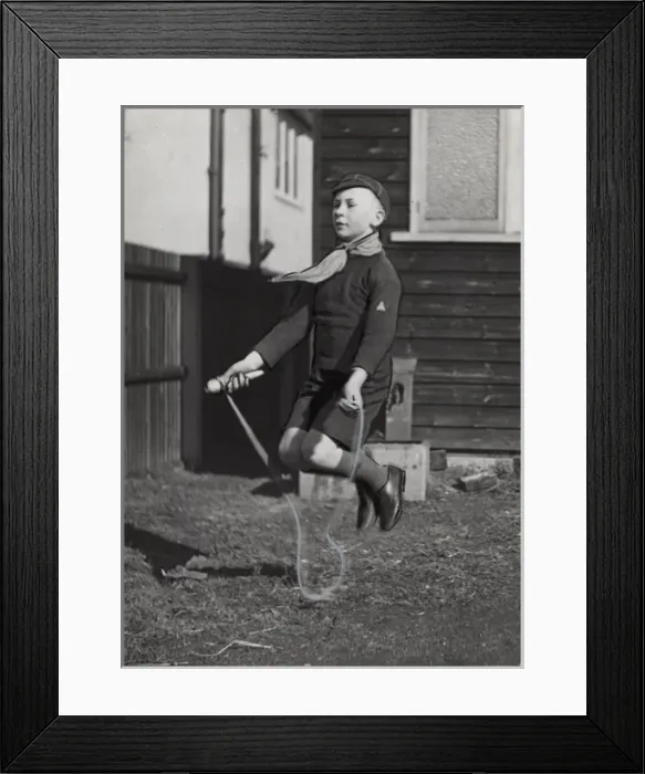 Framed Print : Dutch cub scout skipping with a rope, Netherlands Framed Print : Dutch cub scout skipping with a rope, Netherlands