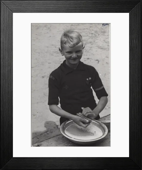 Framed Print : Dutch boy scout scrubbing his fingernails, Holland Framed Print : Dutch boy scout scrubbing his fingernails, Holland