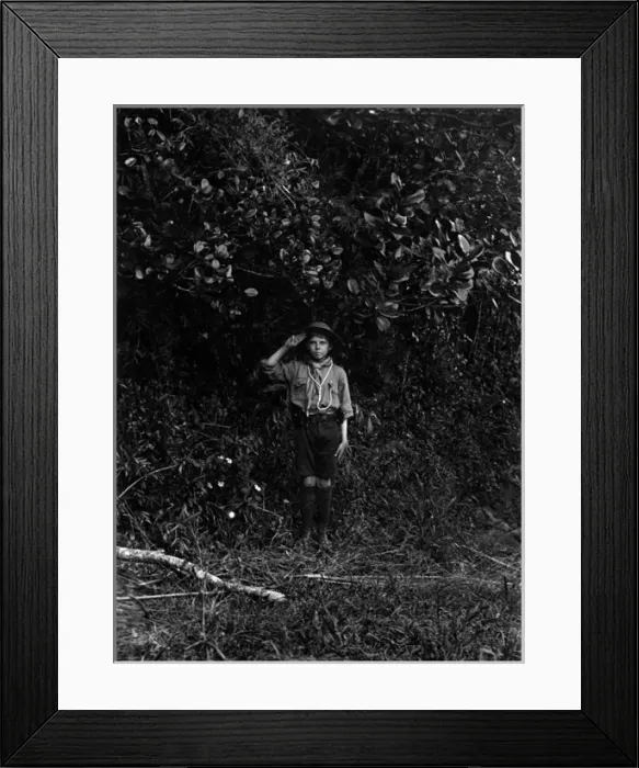 Framed Print : Young boy scout saluting, Mauritius Framed Print : Young boy scout saluting, Mauritius