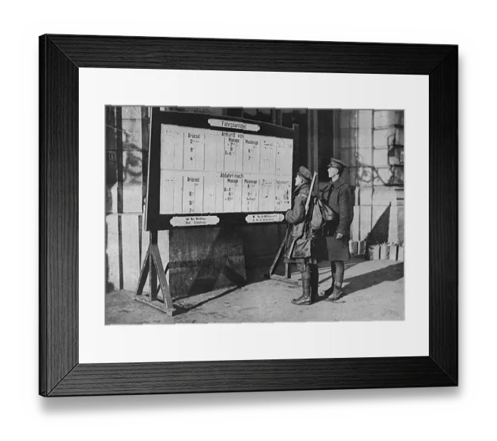 Framed Print : British soldiers looking at German timetable in Mons station Framed Print : British soldiers looking at German timetable in Mons station