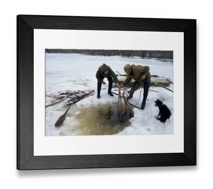 Framed Print : Under-ice net fishing, typical in Russia and particularly