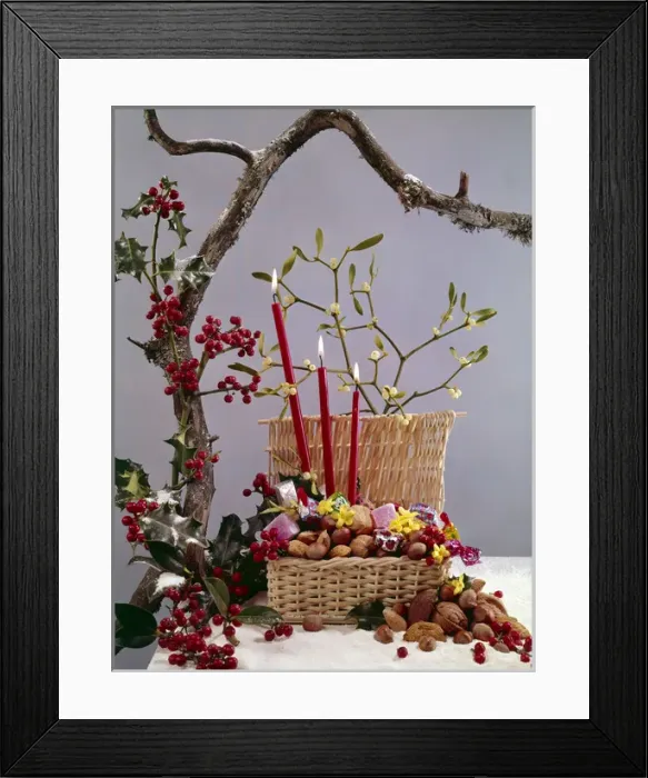 Framed Print : Christmas arrangement of candles, holly, mistletoe and nuts Framed Print : Christmas arrangement of candles, holly, mistletoe and nuts