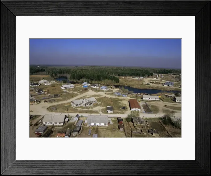 Framed Print : Maloyuganskii village - aerial of village and taiga forest Framed Print : Maloyuganskii village - aerial of village and taiga forest