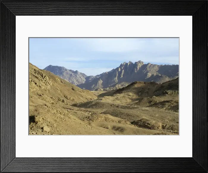 Framed Print : Egypt - a road winds through rocks in Arabian desert Framed Print : Egypt - a road winds through rocks in Arabian desert