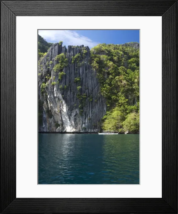 Framed Print : A traditional Philippine boat with tourists on-board Framed Print : A traditional Philippine boat with tourists on-board