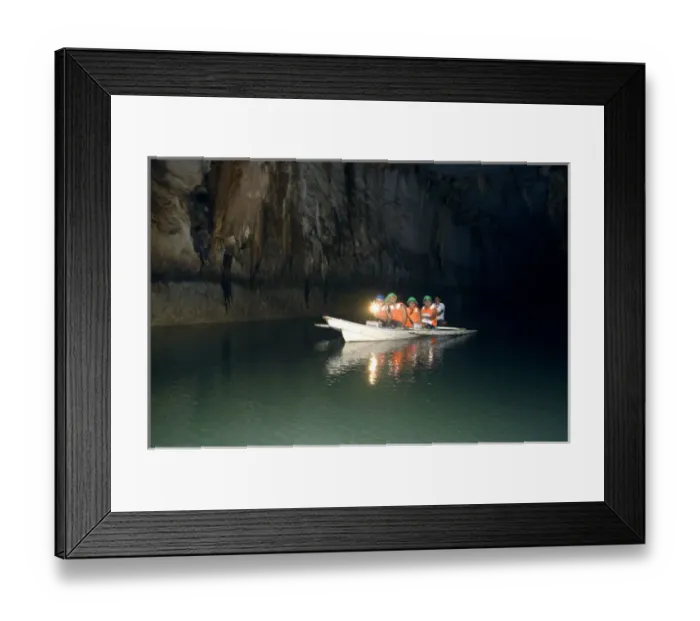 Framed Print : A group of tourists on a boat with a guide - inside Framed Print : A group of tourists on a boat with a guide - inside