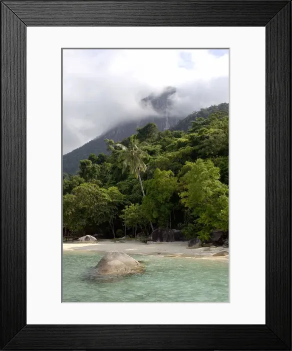 Framed Print : Sand beach and rainforest on slopes of volcanic Framed Print : Sand beach and rainforest on slopes of volcanic