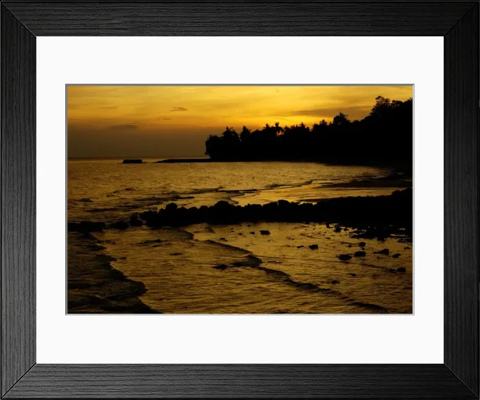 Framed Print : Sunset over a beach and rainforest on slopes of Framed Print : Sunset over a beach and rainforest on slopes of
