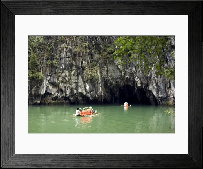 Framed Print : Boats with tourists enter the cave, that features Framed Print : Boats with tourists enter the cave, that features