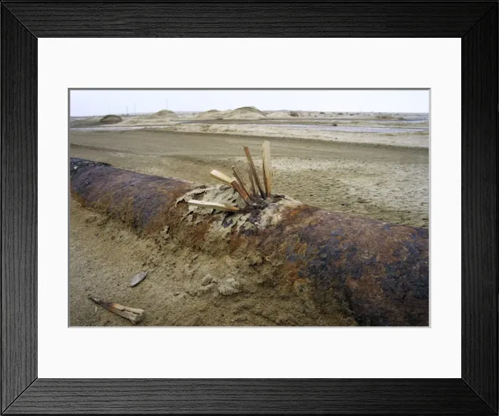 Framed Print : Wooden wedges are used to fix a leakage - an old Framed Print : Wooden wedges are used to fix a leakage - an old