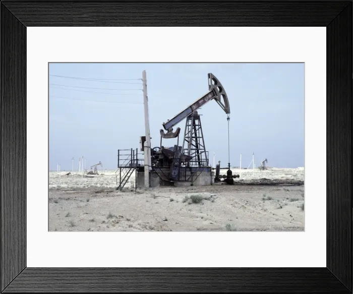 Framed Print : A typical oil-pump - oil-well in a desert Framed Print : A typical oil-pump - oil-well in a desert