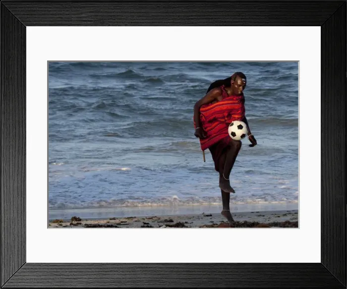 Framed Print : Msai Tribesman - rests playing football after Framed Print : Msai Tribesman - rests playing football after