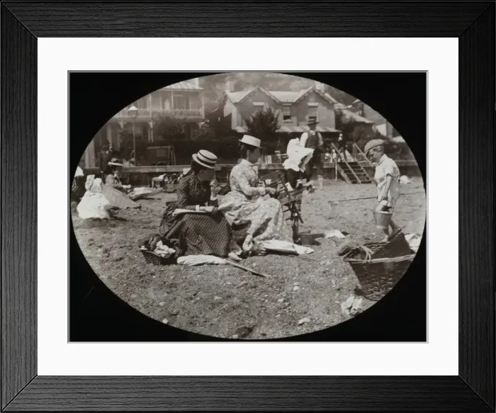 Framed Print : Two ladies sitting on what appears to be a beach Framed Print : Two ladies sitting on what appears to be a beach