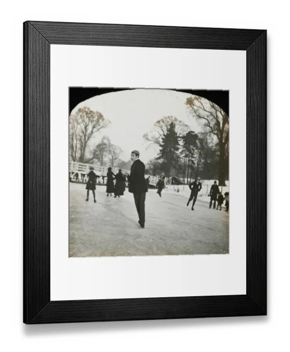 Framed Print : Ice skaters skate over a frozen river Framed Print : Ice skaters skate over a frozen river