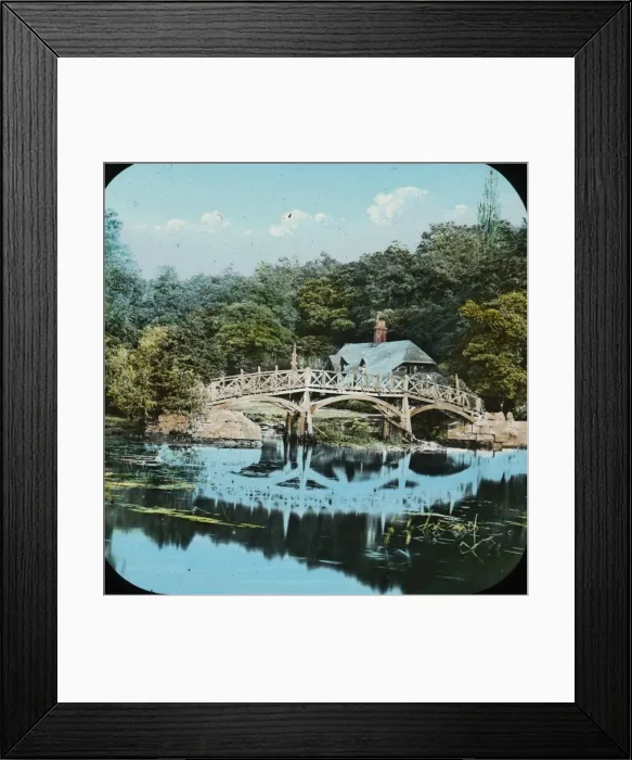 Framed Print : Ornate wooden bridge as seen from a large ornamental pond Framed Print : Ornate wooden bridge as seen from a large ornamental pond