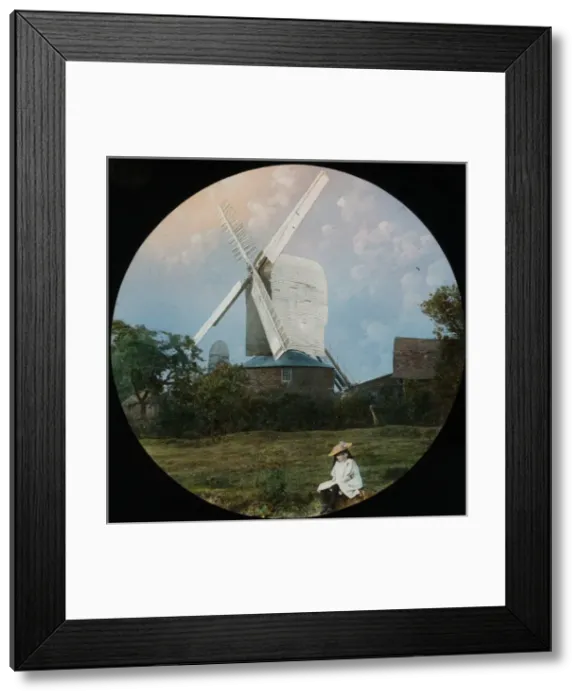 Framed Print : Young girl sitting in rural landscape Framed Print : Young girl sitting in rural landscape