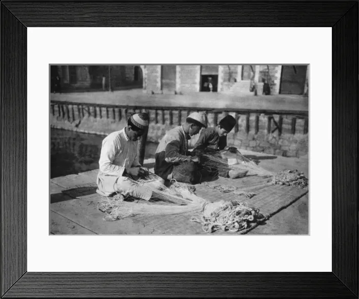Framed Print : Three men repairing fishing nets, Holy Land Framed Print : Three men repairing fishing nets, Holy Land