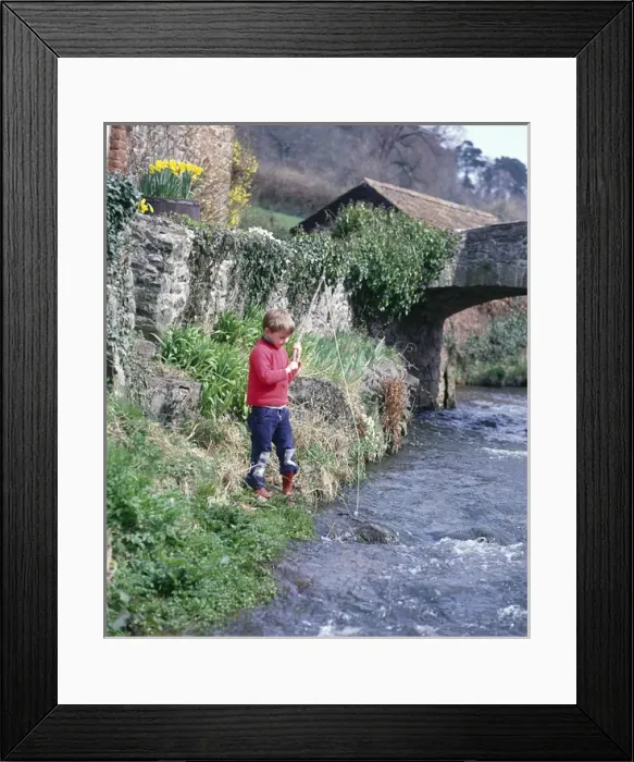 Framed Print : Boy fishing in a stream, Allerford, Somerset Framed Print : Boy fishing in a stream, Allerford, Somerset