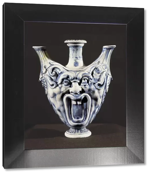 Medici porcelain. Three grotesque-style spouts
