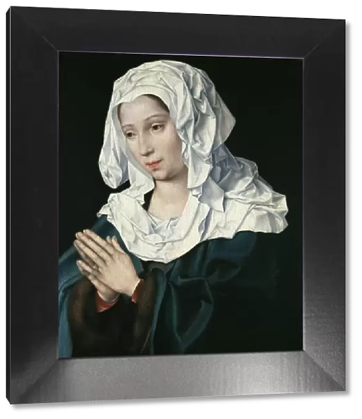 Joos Van Cleve (1485-1541). The Virgin Mary praying