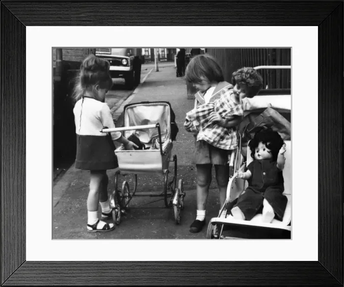Framed Print : Girls with dolls and prams, Balham, SW London Framed Print : Girls with dolls and prams, Balham, SW London