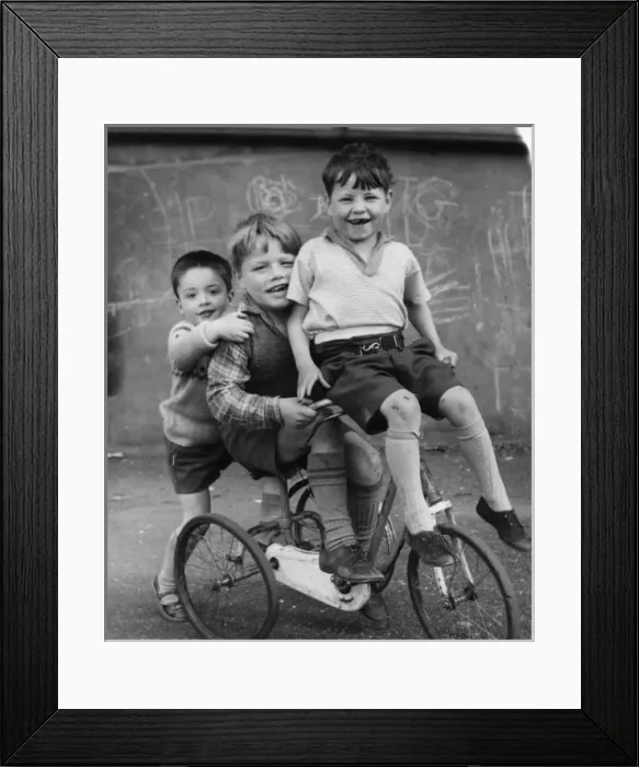 Framed Print : Boys on a tricycle in a Balham street, SW London Framed Print : Boys on a tricycle in a Balham street, SW London