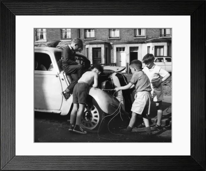 Framed Print : Children playing with a car in a Balham street, SW London Framed Print : Children playing with a car in a Balham street, SW London
